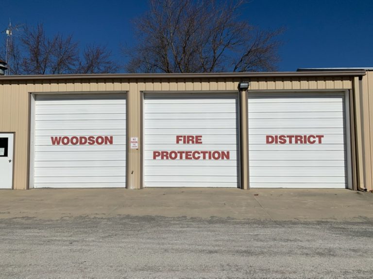 Woodson Fire Protection District station with three bay doors