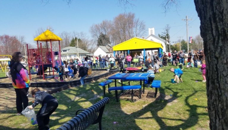Children and parents at the playground during the egg hunt