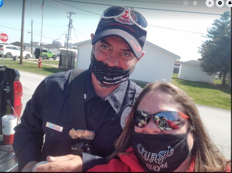Police officer and resident at a community event