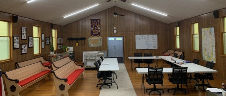 Village Hall meeting room with benches and tables
