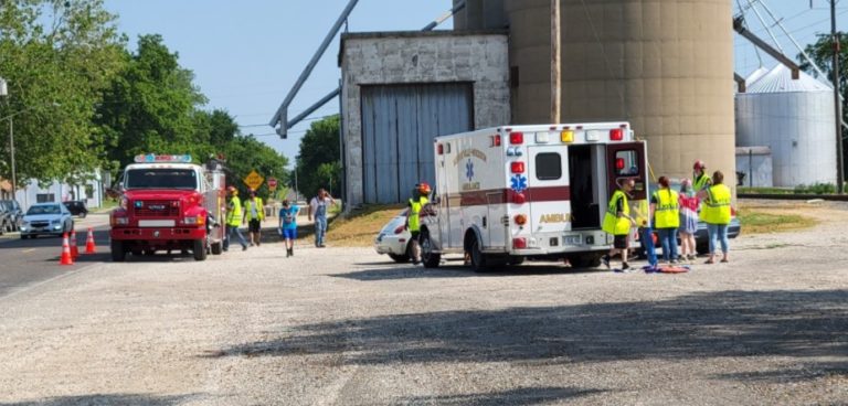 Rescue crew working around a car during training