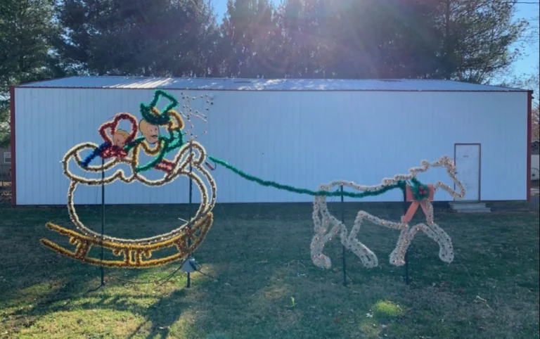 Holiday sleigh and horse decoration in daylight